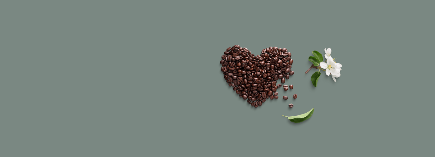 coffee beans laid in a heart shape