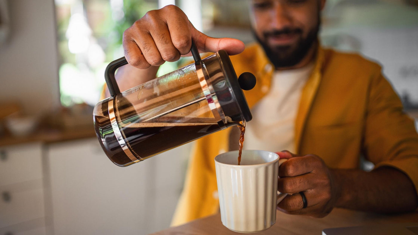Man brewing with a french press