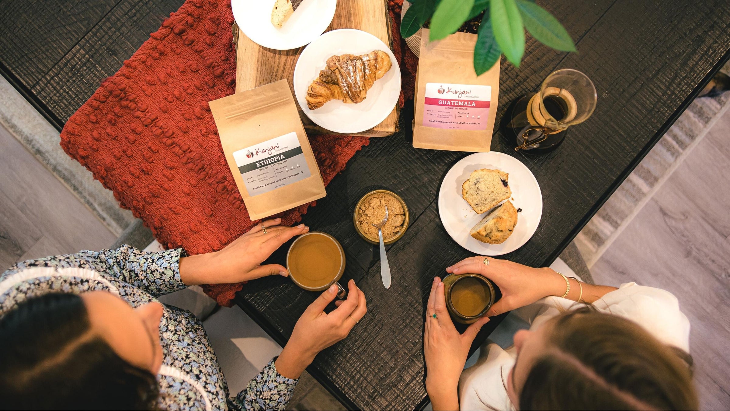 Young women drinking coffee at home