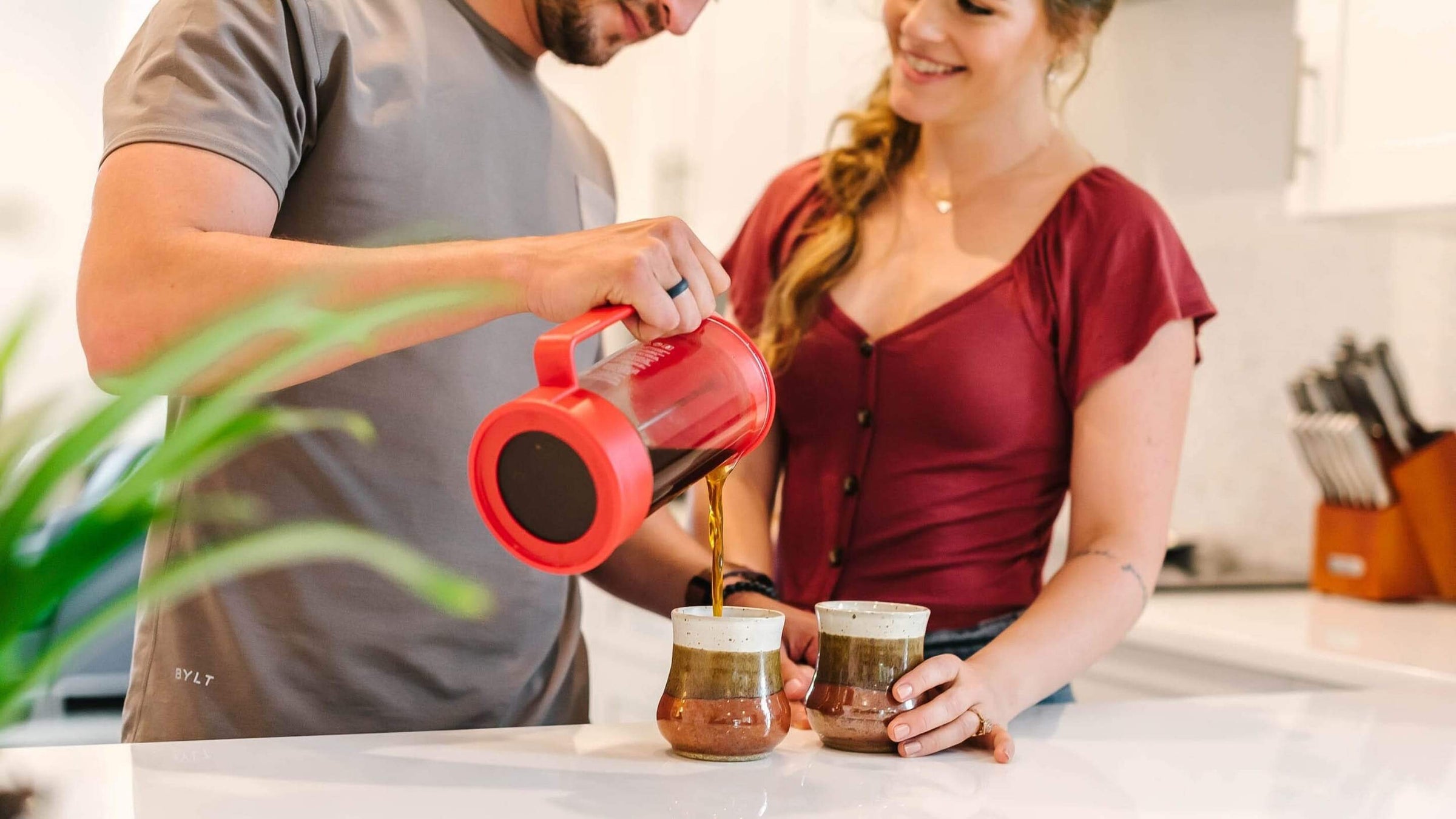 Couple enjoying their coffee subscription at home